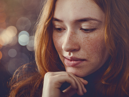 Redhead woman, tender and stylish female portraitの写真素材