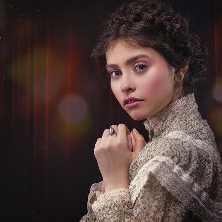 Theater and stage. Dramatic retro style female portraitの写真素材