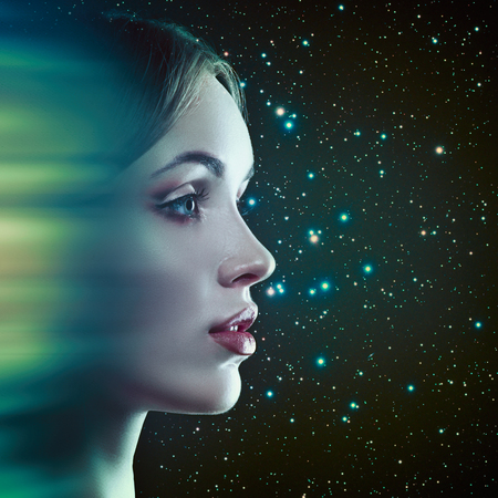 Instant Teleport. Fantastic female portrait with motion design and space backgroundsの写真素材