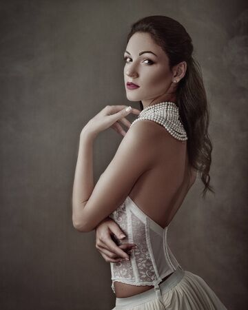 Sensuality. Beauty brunette, retro styled female portrait