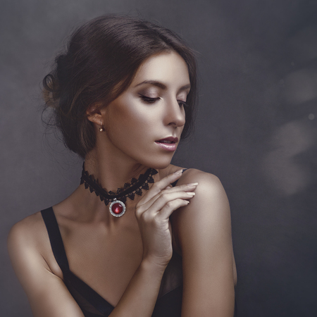 Sensuality. Beauty brunette, retro styled female portraitの写真素材