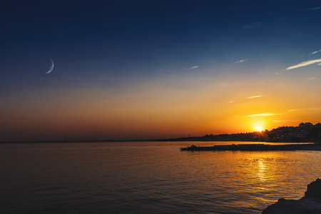 Beautiful summer twilight over the sea surface, natural backgroundsの写真素材