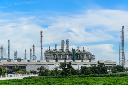 Petrochemical plant with the cassava trees foreground in Thailandのeditorial素材