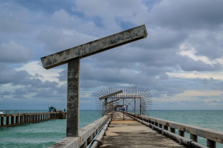 Concrete bridge to the sea in Thailandの写真素材