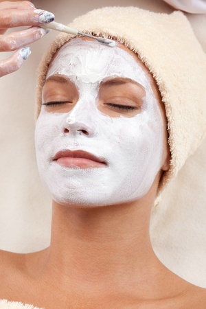 Healthy spa  young beautiful relaxing woman having moistening mask applied  XXXLの写真素材