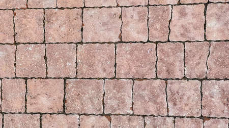 A wall of tiles. Brick wall. Background for photography. Old wall background. Textureの写真素材