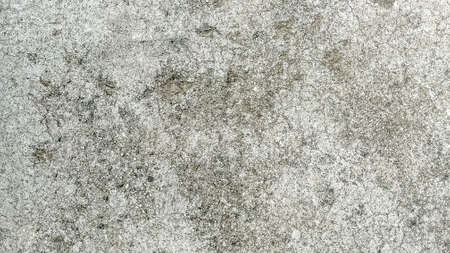 A gray wall of concrete. Gray background. Gray concrete textureの写真素材