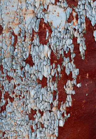 grunge texture of the old cracked paint with rust on metal backgroundの写真素材