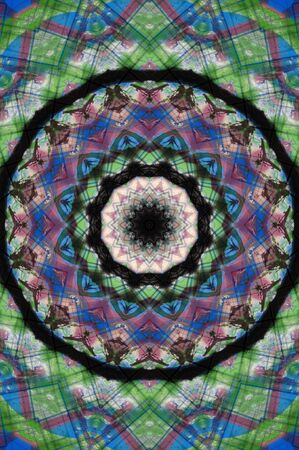 Abstract Colorful Painted Kaleidoscopic Graphic Background. Futuristic Psychedelic Hypnotic Backdrop Pattern With Texture. Folk Ethnic Floral Ornamental Mandala. Vintage Decorative Geometric Mosaicの写真素材