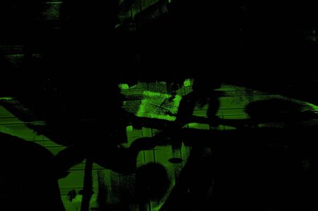 Green Black White Aged Grunge Wall Background. Old Weathered Peeled Painted Plaster Backdrop. Abstract Antique Cracked Stain Texture Background. Damaged Retro Stucco Scratched Patternの写真素材