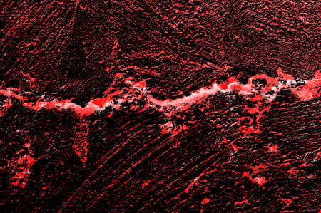 Red Black White Aged Grunge Wall Background. Old Weathered Peeled Painted Plaster Backdrop. Reddish Abstract Antique Cracked Stain Texture Background. Damaged Retro Stucco Scratched Patternの写真素材