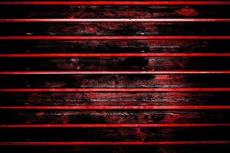 Red Black White Aged Grunge Wall Background. Old Weathered Peeled Painted Plaster Backdrop. Reddish Abstract Antique Cracked Stain Texture Background. Damaged Retro Stucco Scratched Patternの写真素材