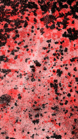 Red Black White Aged Grunge Wall Background. Old Weathered Peeled Painted Plaster Backdrop. Reddish Abstract Antique Cracked Stain Texture Background. Damaged Retro Stucco Scratched Patternの写真素材