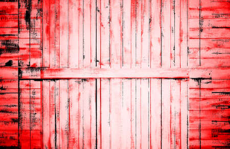 Red Black White Aged Grunge Wall Background. Old Weathered Peeled Painted Plaster Backdrop. Reddish Abstract Antique Cracked Stain Texture Background. Damaged Retro Stucco Scratched Patternの写真素材