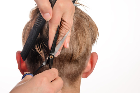 Young men at professional barber, hair saloonの写真素材