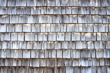 Weathered wooden shingles backgroundの写真素材