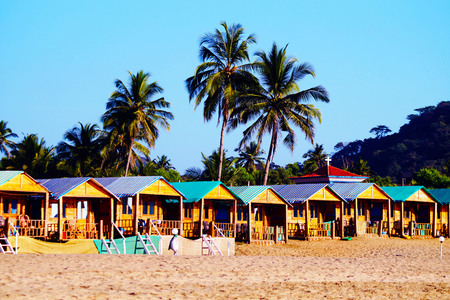 Cozy private resort (bungalows) on the beach, Agonda beach, South Goa. Colorful beach huts.の写真素材
