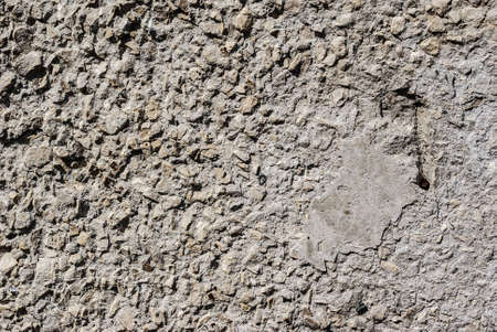the old dirty gray concrete wall backgroundの写真素材