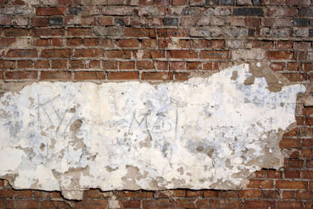 the old brick wall in grunge styleの写真素材