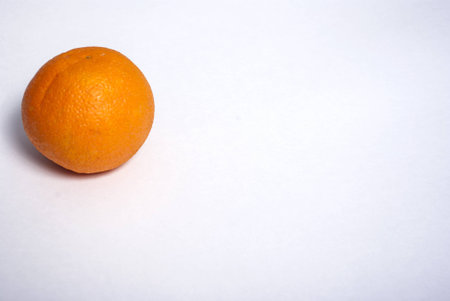 Orange ripe orange on a white backgroundの写真素材