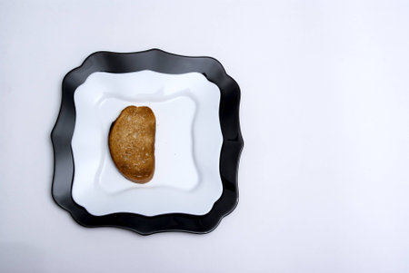 Crispy slice of bread on a plateの写真素材