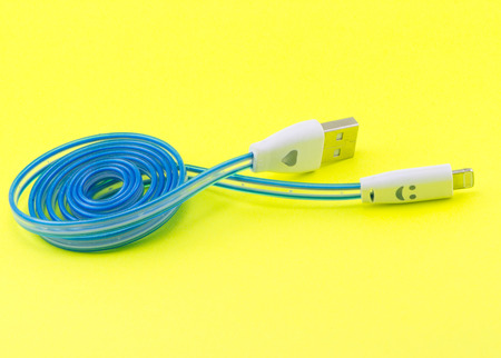 Telephone cable on a yellow background