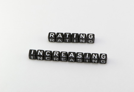 Rating grows phrase cubes on a white backgroundの写真素材