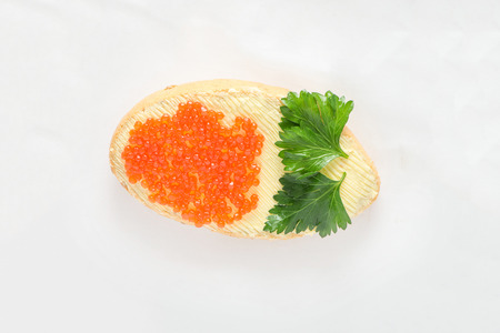Caviar on the sandwich with greensの写真素材