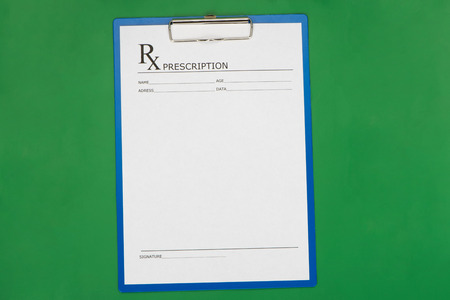 Blank prescription form on desktop backgroundの写真素材