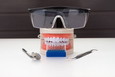 Dentist job as a symbol on a white backgroundの写真素材