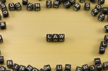 The word law on wood backgroundの写真素材