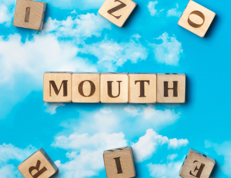 The word Mouth on the sky backgroundの写真素材