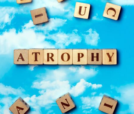 The word atrophy on the sky backgroundの写真素材