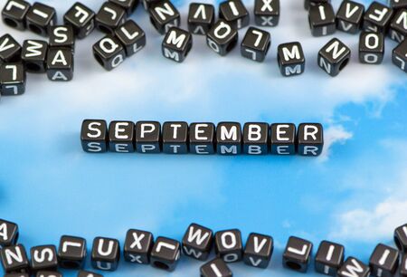 The word September on the sky backgroundの写真素材