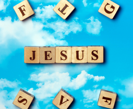 The word jesus on the sky backgroundの写真素材