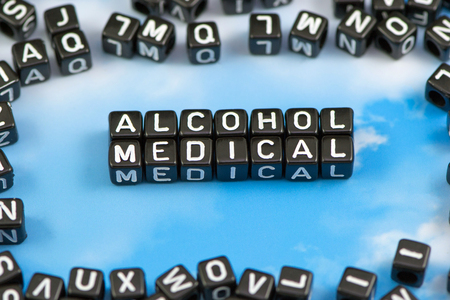 The word alcohol medical on the sky backgroundの写真素材