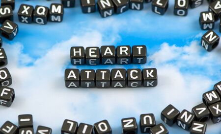 The word heart attack on the sky backgroundの写真素材