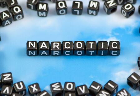 The word narcotic on the sky backgroundの写真素材