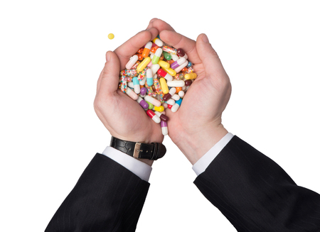 Medications in the hands of manの写真素材