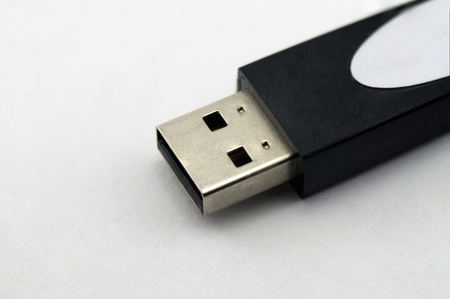 Flash drive close-up on a white backgroundの写真素材
