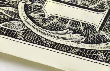 The dollar unit close-up lies at an angle