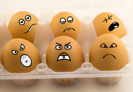 Sad eggs on a white backgroundの写真素材