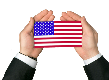 US flag in handsの写真素材