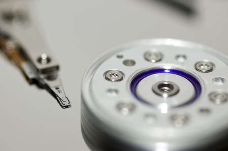 Opened harddisk and headの写真素材
