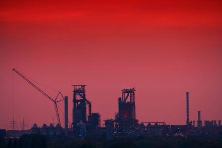 Global warming. Industrial Skyline after sunset.の写真素材