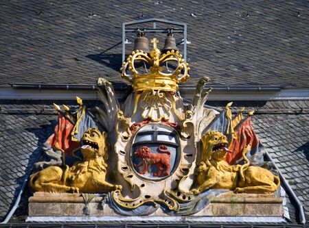 Stylized former coat-of-arms of the German city Bonn. Detail on the town-hall facade.の写真素材