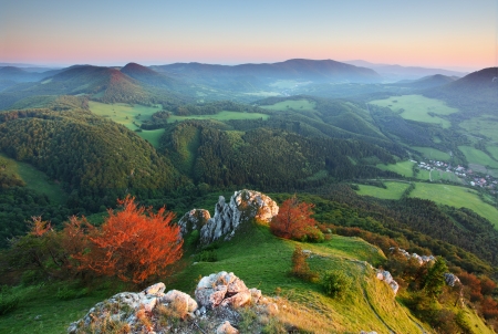 Landscape with rocky mountains at sunsetの写真素材