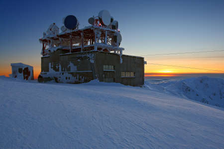 Screen weather station in nice sunsetの写真素材