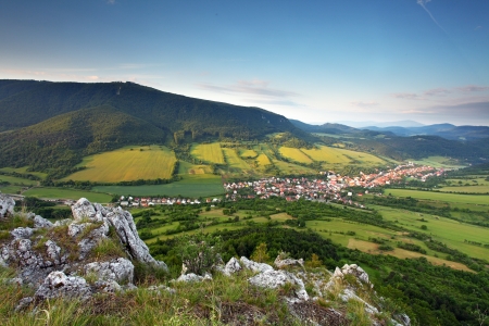Landscape with village, mountains and blu skyの写真素材
