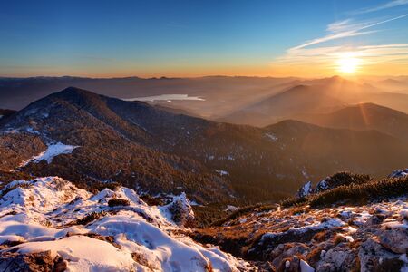 Majestic sunset in the winter mountains landscape の写真素材